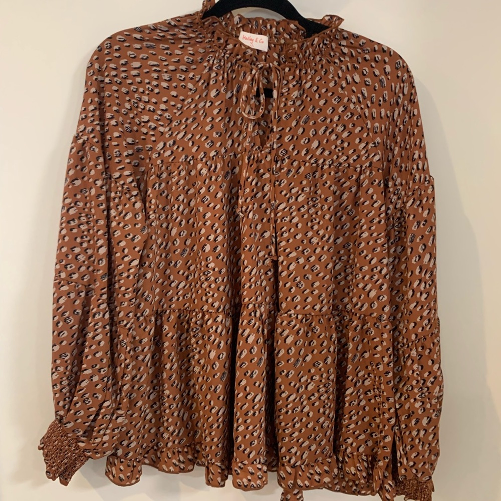 Hailey & Co Animal print top.
